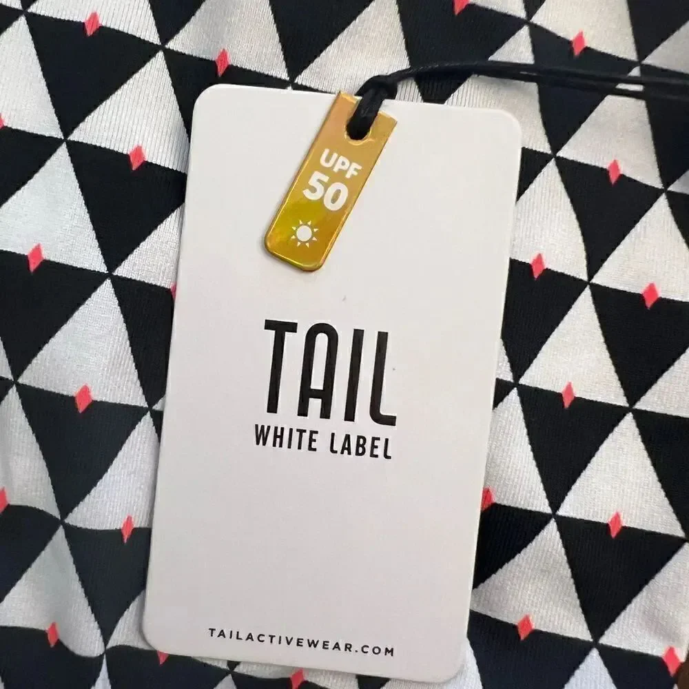 NWT Tail Activewear White Label women’s Gold Top. Size Small. UPF 50 jersey top.